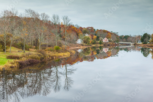 USA, Maine Orland, village reflection during autumn. photo