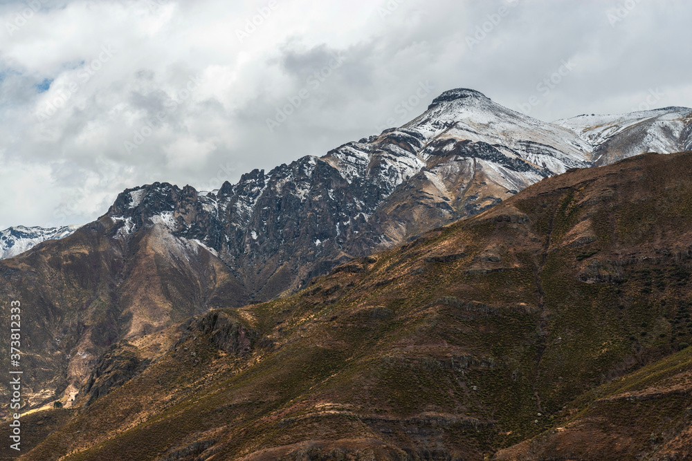 Dramatic Andes mountain range in the snow, Colca Canyon, Arequipa region, Peru