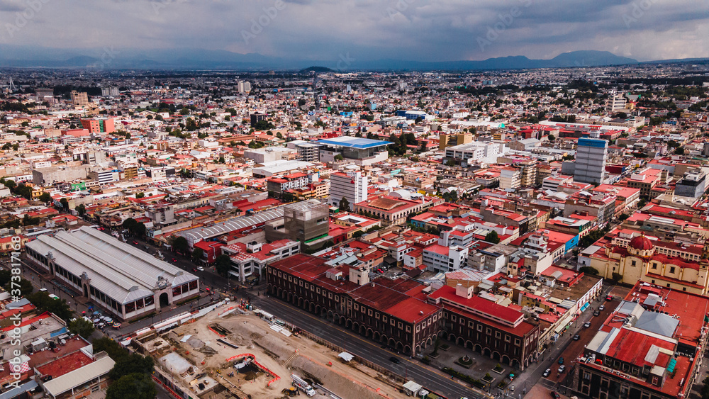 Aerial photography of the center of Toluca, Mexico, you can see several emblematic places such as the Cosmo Vitral, the Plaza de los Martires