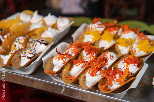 Bangkok Street Food Cray - dessert tacos called Kanom Bueang photo