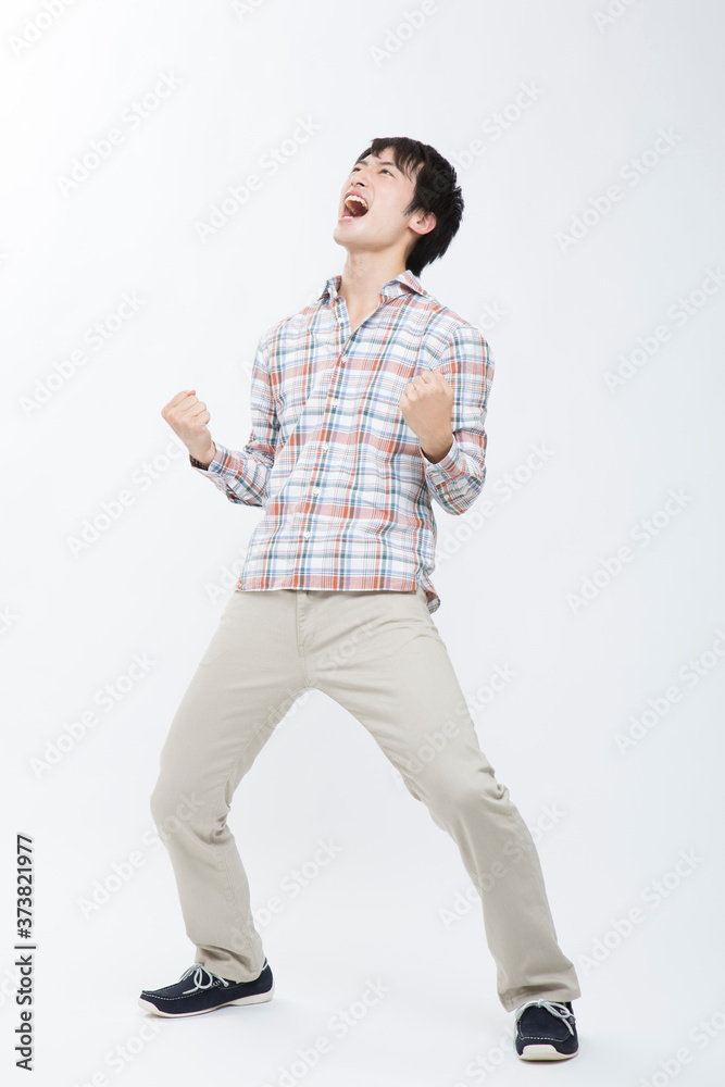 ガッツポーズする男性 ガッツポーズする男性