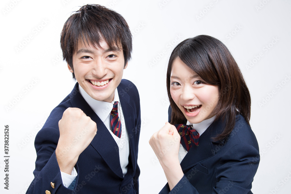 ガッツポーズをする高校生 ガッツポーズをする高校生