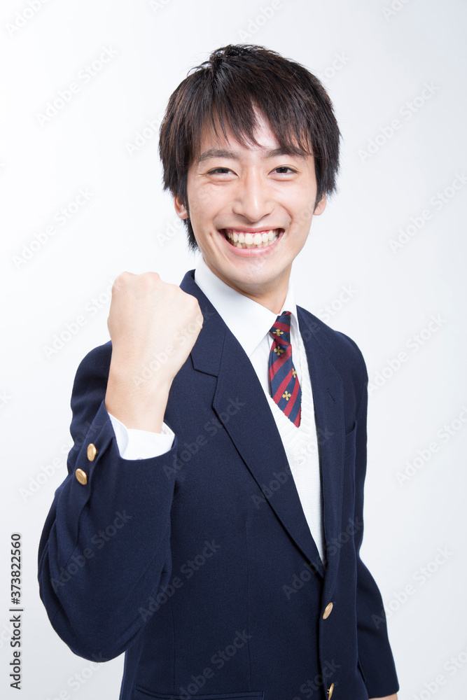 ガッツポーズをする男子高校生 Stock 写真 Adobe Stock