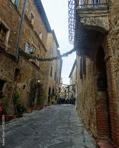 Fototapeta Naklejka Na Ścianę i Meble -  The streets of Pienza, Tuscany ,Italy
the tight brick lanes of Piezna , Tuscany, Italy 