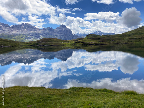 The alpine lake Tannensee or Tannen Lake in the Uri Alps mountain massif, Kerns - Canton of Obwald, Switzerland (Kanton Obwalden, Schweiz) photo