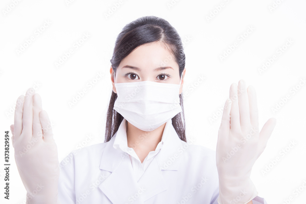 手袋をする女医 手袋をする女医