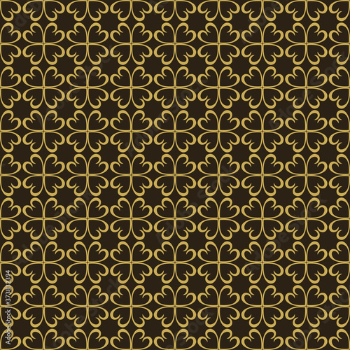Decorative seamless pattern gold ornament on a black background. Perfect for your design: fabric, wallpaper, background image, wrapping paper