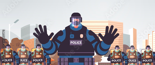 policeman in full tactical gear riot police officer showing stop gesture protesters and demonstrations control riots mass concept cityscape portrait horizontal vector illustration