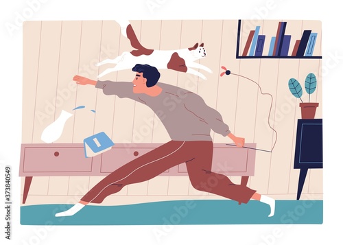 Joyful man playing with funny cat at home vector flat illustration. Happy pet owner holding toy catching agility kitty having fun together isolated. Smiling male spending time with domestic animal