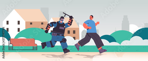 policeman in full tactical gear riot police officer attacking street protester during clashes demonstration protest concept full length horizontal vector illustration