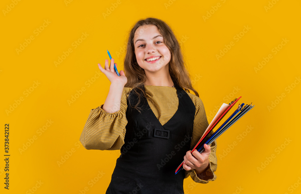 god results. get knowledge from archive. Young business kid holding folder. Beautiful brunette girl with folder of documents in her hands. teen kid holds folder in hands. office life god results. get knowledge from archive. Young business kid holding folder. Beautiful brunette girl with folder of documents in her hands. teen kid holds folder in hands. office life