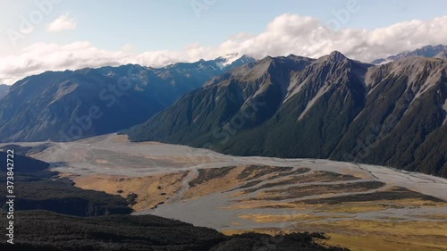 Southern Alps at Athurs Pass aerial look up shot of mountains and valley scenery. New Zealand photo