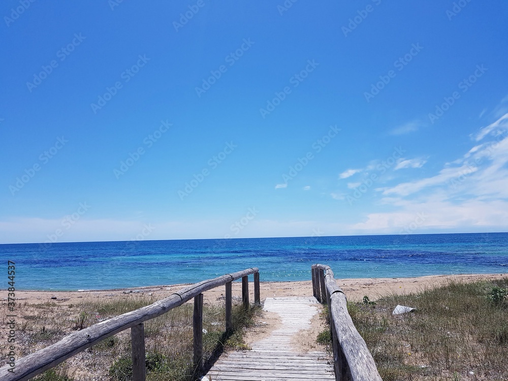 wooden bridge over the sea