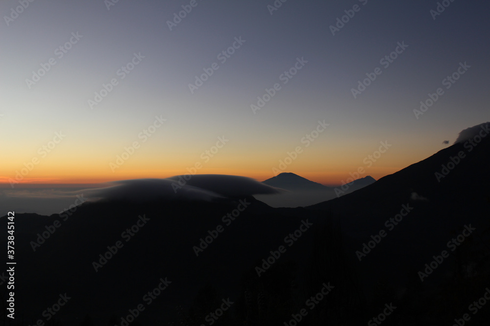 golden sunrise mountain, view from bukit sikunir (sikunir hill) Dieng Wonosobo Central Java Indonesia golden sunrise mountain, view from bukit sikunir (sikunir hill) Dieng Wonosobo Central Java Indonesia
