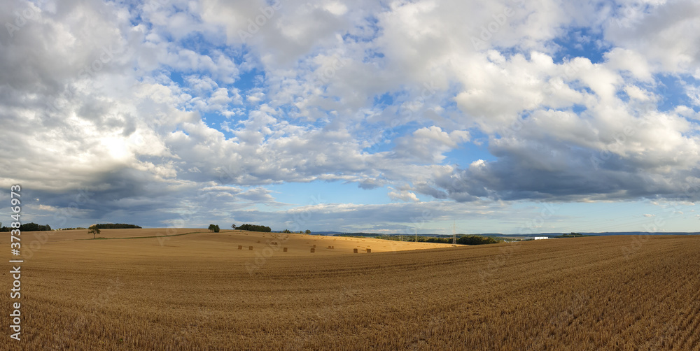 scenic panorama view of natural landscape under a cloudy sky scenic panorama view of natural landscape under a cloudy sky