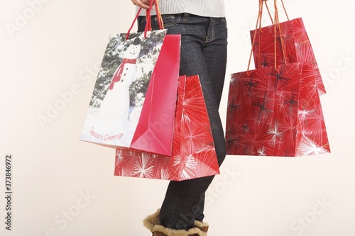 Woman holding Christmas shopping bags