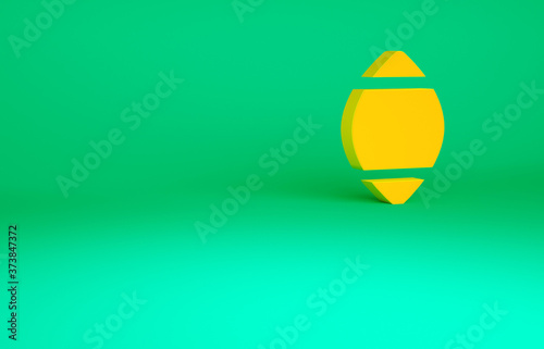 Orange American Football ball icon isolated on green background. Rugby ball icon. Team sport game symbol. Minimalism concept. 3d illustration 3D render.