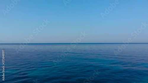 Wallpaper Mural Blue azure water of open sea and clear bright sky at summer sunny day, copy space for vacation texture Torontodigital.ca
