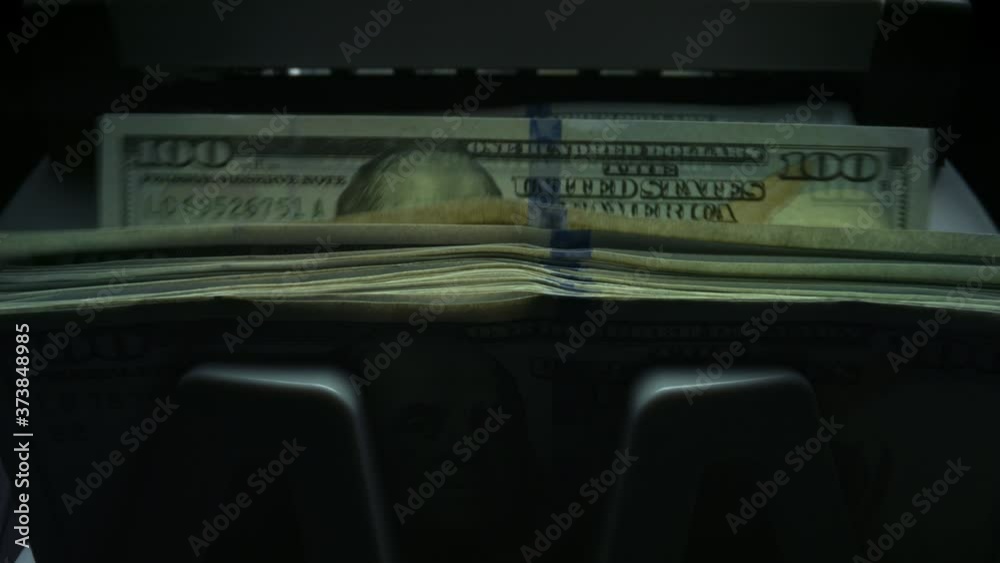 Money counting equipment. Currency counting machine counting dollar bills