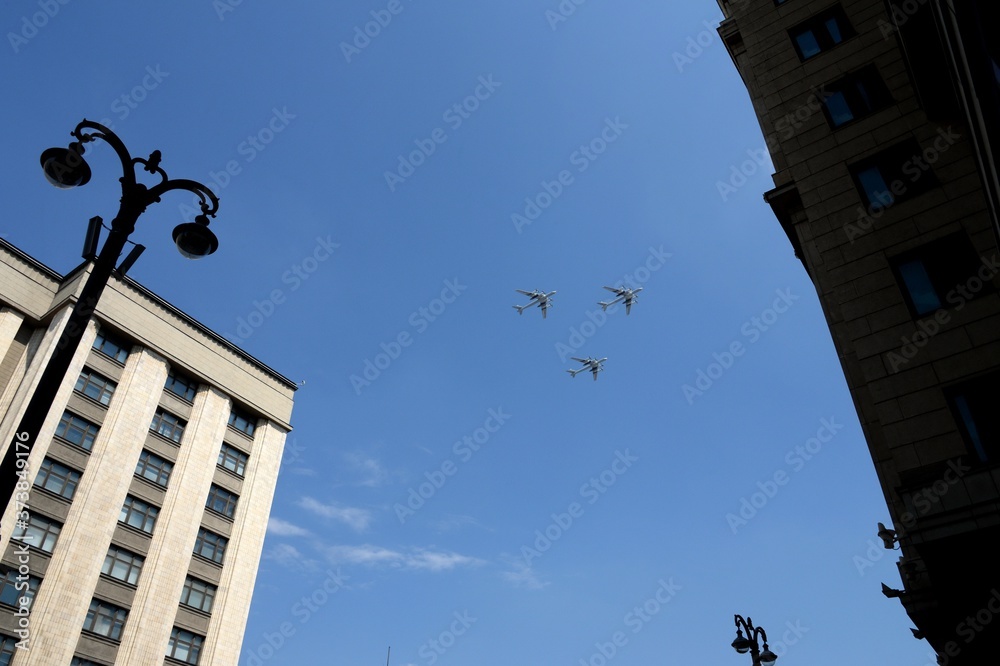 A group of Tu-95MS turboprop strategic bombers in the sky over Moscow during the dress rehearsal of the parade dedicated to the 75th anniversary of Victory