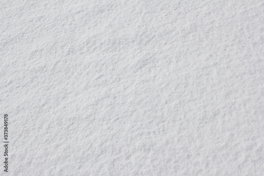 Texture of fresh snow covering the ground in winter . Texture of fresh snow covering the ground in winter .