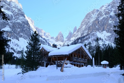 Rifugio Fondovalle in beautiful mountain Val Fiscalina in Dolomites in snowy winter day. Sexten Dolomites, South Tyrol, Italy 