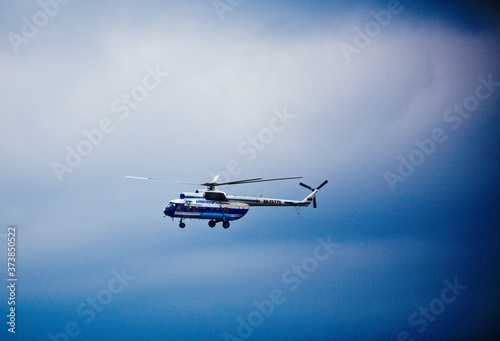 Fototapeta Naklejka Na Ścianę i Meble -  passenger helicopter in the sky close up