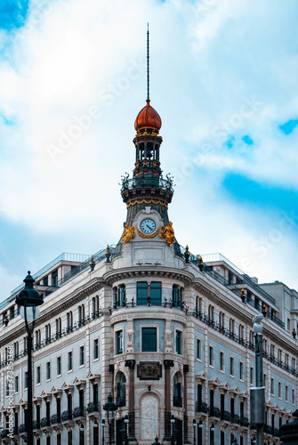 Vertical low angle shot of Edificio Banesto building in Madrid, Spain photo