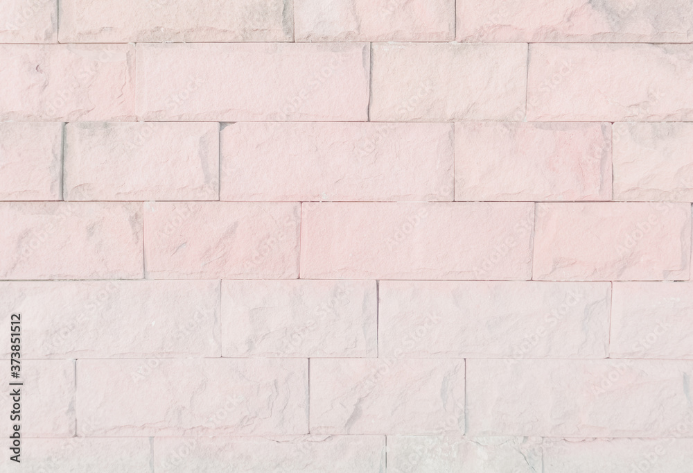 Empty Pink brick wall texture background in the bedroom at lovely. Brickwork stonework interior, rock old clean concrete grid uneven abstract weathered brick design, horizontal architecture wallpaper. Empty Pink brick wall texture background in the bedroom at lovely. Brickwork stonework interior, rock old clean concrete grid uneven abstract weathered brick design, horizontal architecture wallpaper.