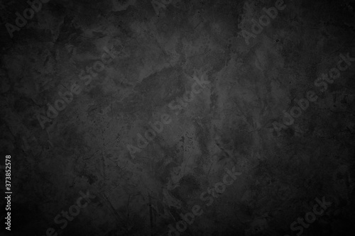 Close up retro plain dark black cement & concrete wall background texture for show or advertise or promote product and content on display and web design element concept decor. © Manitchaya