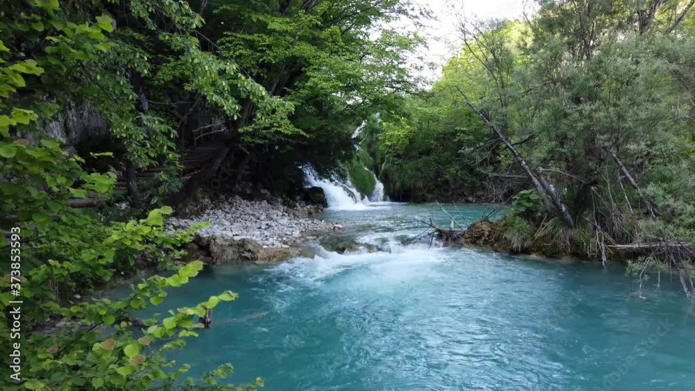 Majestic view on waterfall with turquoise water in the Plitvice Lakes National Park, Croatia. Europe. One of the oldest and largest national parks in Croatia. UNESCO World Heritage Majestic view on waterfall with turquoise water in the Plitvice Lakes National Park, Croatia. Europe. One of the oldest and largest national parks in Croatia. UNESCO World Heritage