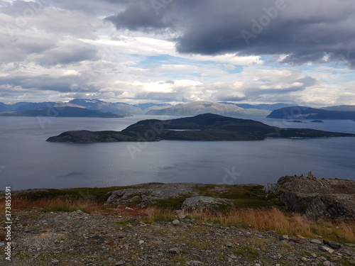 sea and fjord view from the top of the Kvenangsfjellet mountain in Nordreisa, northern Norway