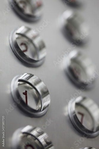 Fotografie Close-up of elevator's push buttons