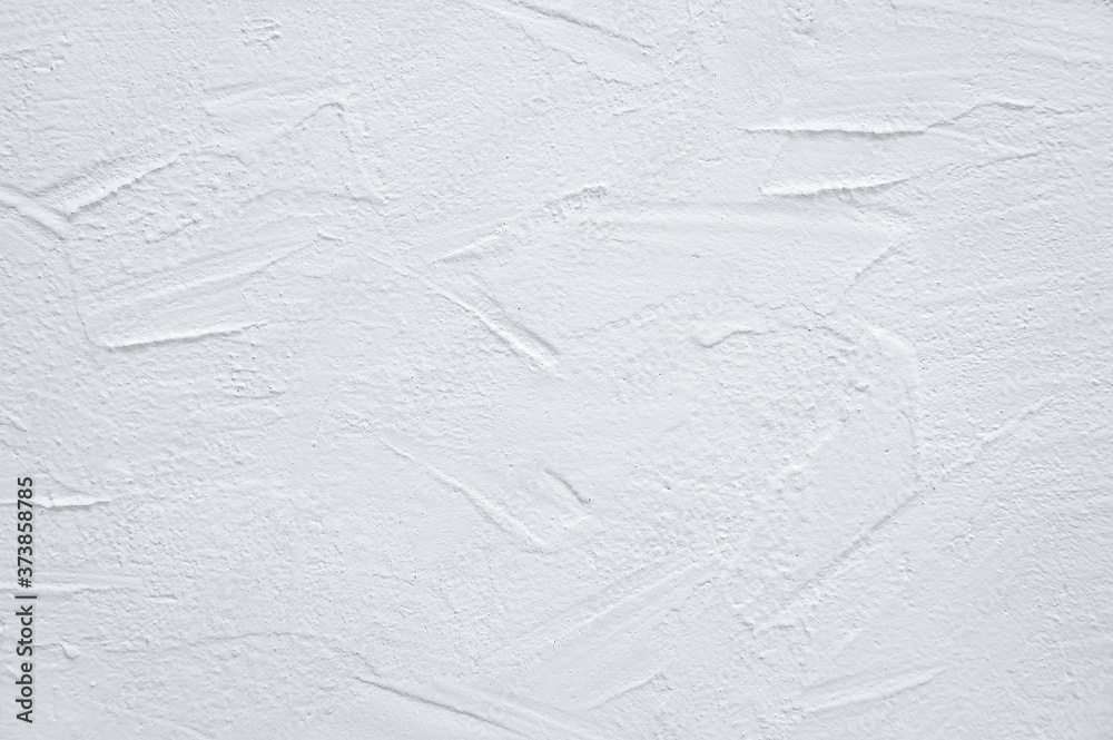 White textured wall. Decorative plaster close-up.