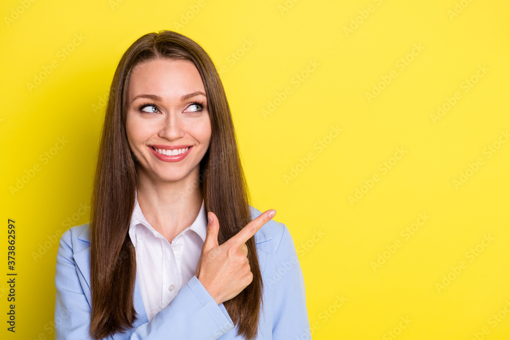 Look business advert. Positive representative agent girl point index finger copyspace demonstrate promo wear suit isolated over bright shine color background Look business advert. Positive representative agent girl point index finger copyspace demonstrate promo wear suit isolated over bright shine color background