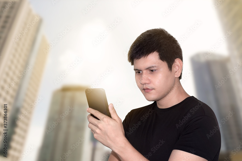 technology communication and people concept - close up of man holding smartphone in city. technology communication and people concept - close up of man holding smartphone in city.