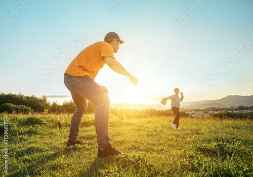 Photography Father and son playing in baseball
