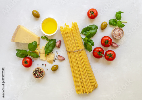Set of products for cooking traditional italian pasta. Raw ingredients, top view