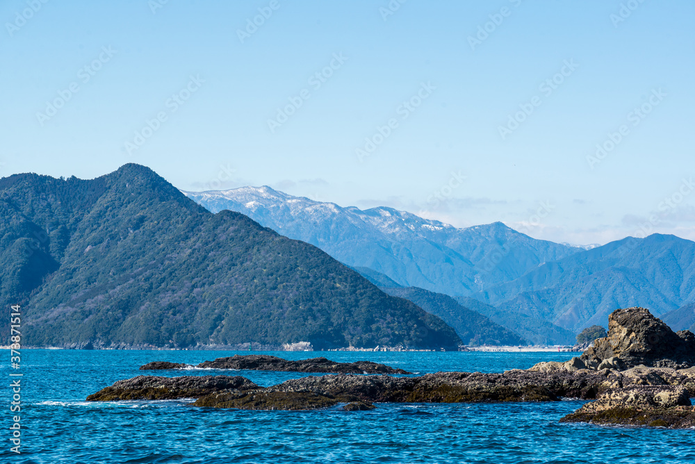 view of the snow-capped mountain top form Owase bay.
Owase, Mie, Japan