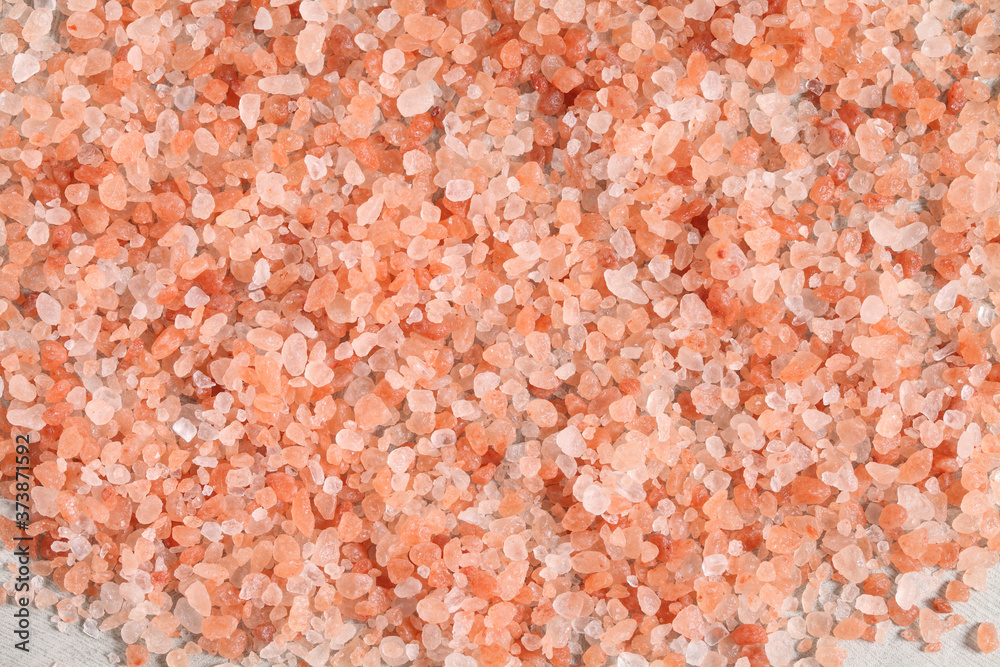 close up a pile of Himalayan pink salt in natural light close up a pile of Himalayan pink salt in natural light