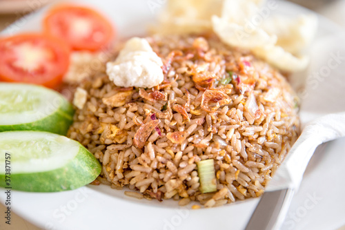 Indonesian Freid Rice With Cucumbers and Tomatoes.