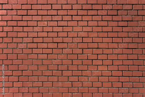background wall of red brick close-up