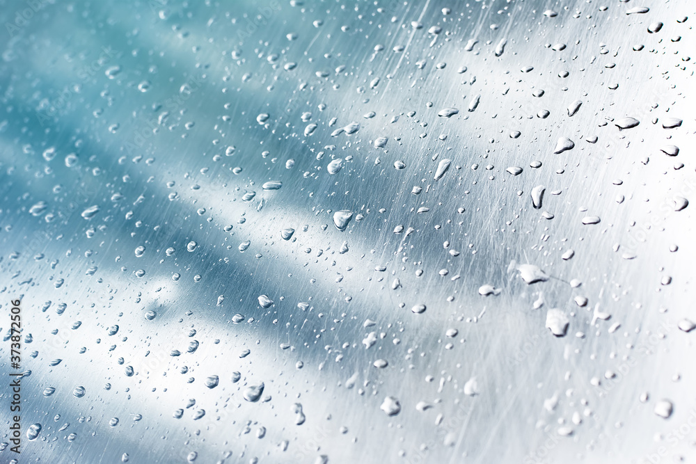 Beautiful water drops on a metal surface Beautiful water drops on a metal surface