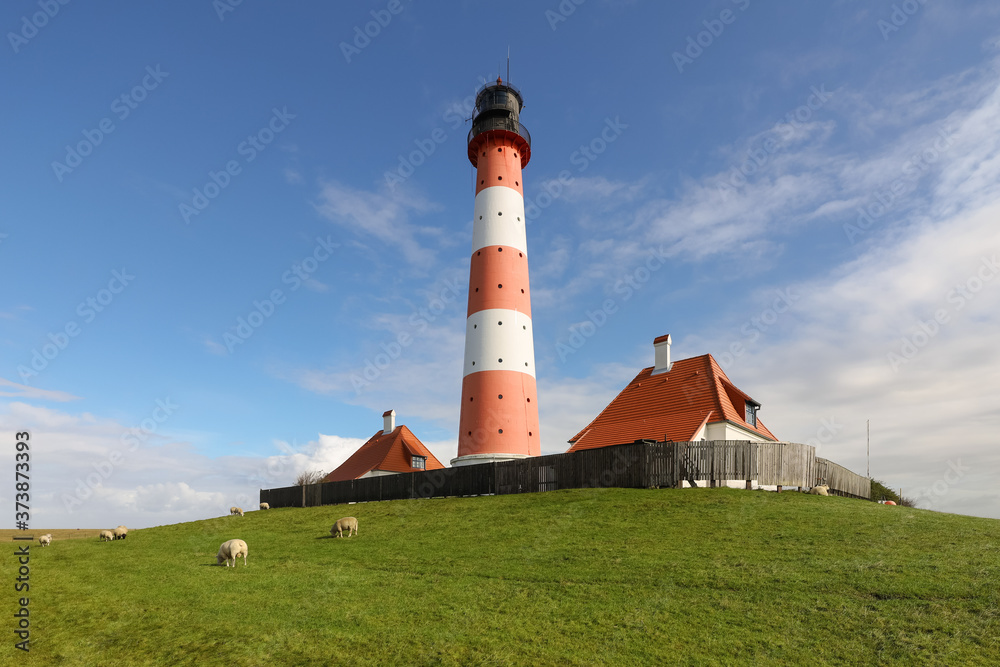 Westerhever Leuchtturm ausgerichtet mit Schafen Westerhever Leuchtturm ausgerichtet mit Schafen