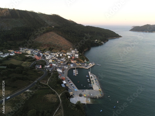 Aerial view in O Barqueiro, beautiful coastal village in Galicia,Spain. Drone Photo photo