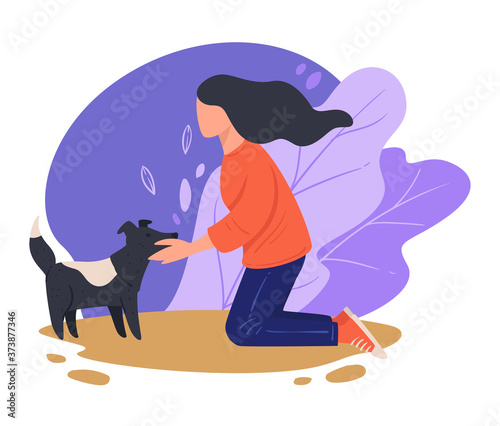 Woman cuddling stray dog outdoors, kind female character
