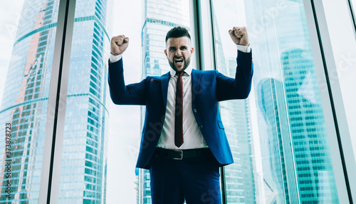 Cheerful manager enjoying successful project