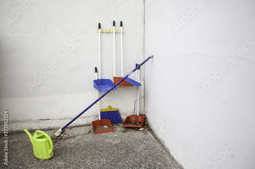 Brooms and mops for cleaning