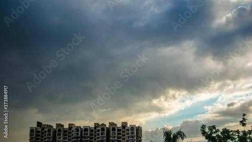 4K Timelapse of Clouds Running Across the blue sky at Sunset. clouds swirl in blue sky at Sunset. 4K Timelapse in Ghaziabad uttar pradesh
 photo