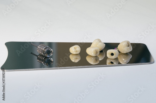 Detail of dental implant, crown elements on zirconium oxide photo